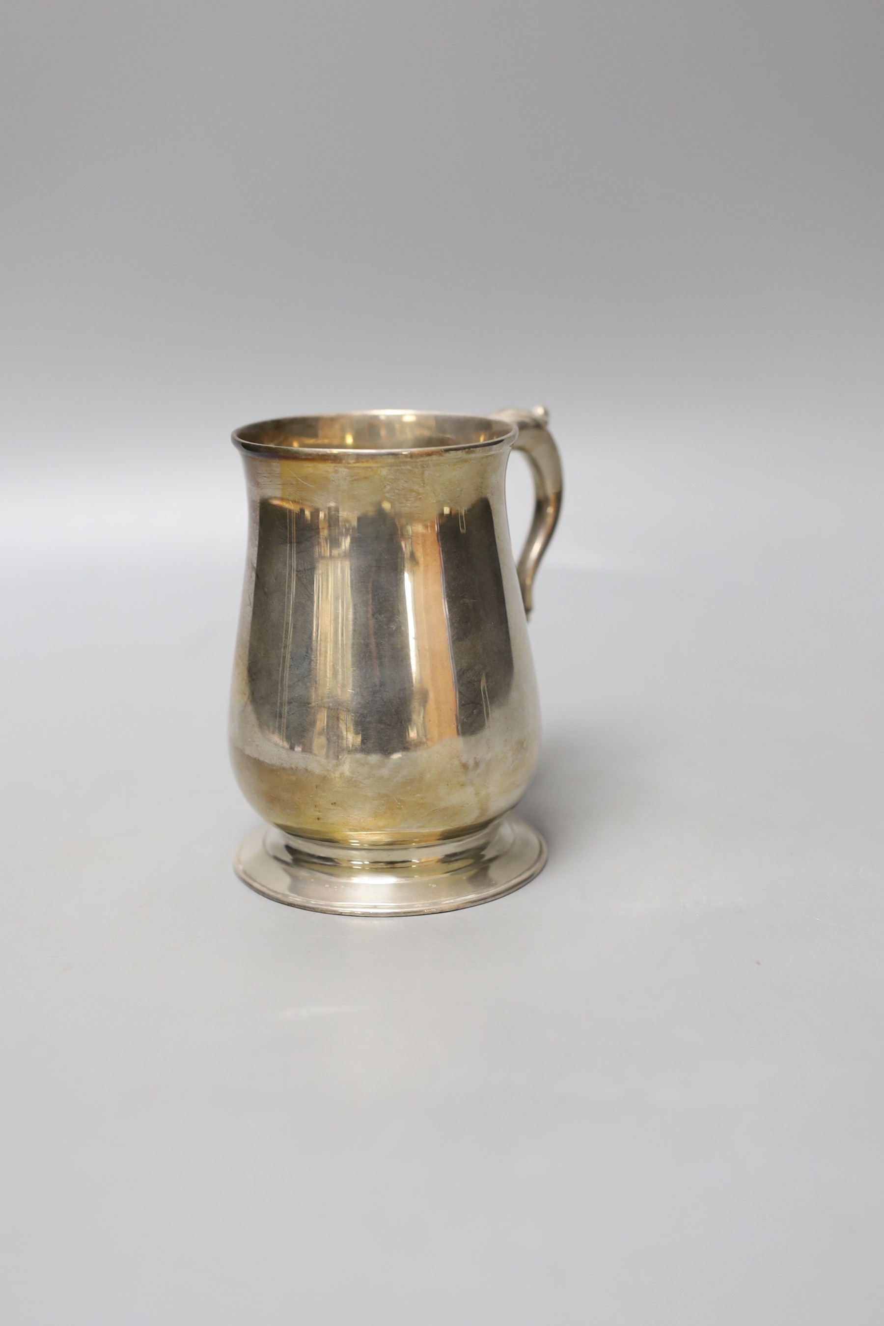 A late George II silver baluster mug, Ebenezer Coker, London, 1759, 10.5cm, 226 grams.